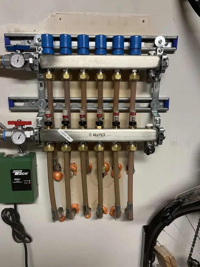 Plumber performing Gas Leak Detection at a residential property in Ipswich